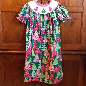 Claire and Charlie smock Christmas tree dress.
